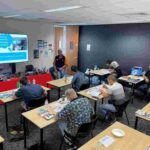 Clinton Brett delivering training in the classroom setting of MTAQ Institute
